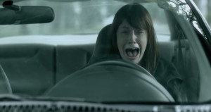 woman-screaming-in-car-crash.original